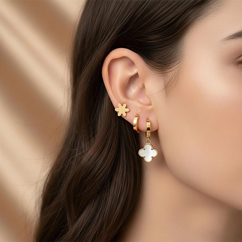 A set of three pairs of gold earrings; combining white mother-of-pearl flower pendants, plain hoops, and rose-shaped gold studs. Made of durable stainless steel, for a perfect look. - Image 2